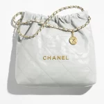 CHANEL / CHANEL 22 HANDBAG Shiny Calfskin & Gold-Tone Metal Light Blue