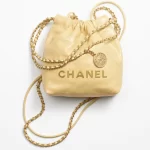 CHANEL / CHANEL 22 MINI HANDBAG Shiny Calfskin & Gold-Tone Metal Yellow Ref.  AS3980 B08037 NQ387