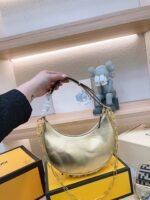 FENDI Patent leather half moon bag Sliver and gold with chain strap Size: 34*16cm