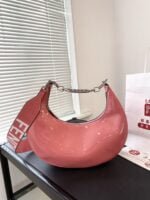 FENDI Patent leather half moon bag Pink Size: 34*16cm